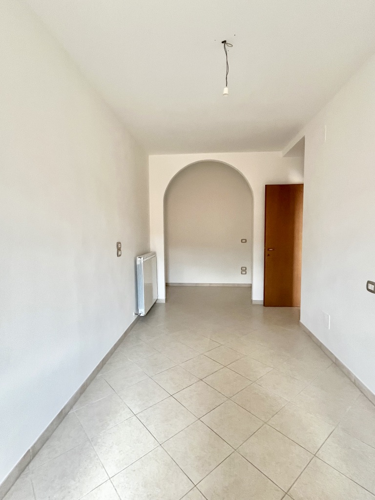 AV 1802_3 APPARTAMENTO CON GIARDINO IN VENDITA CORTONA CAMUCIA